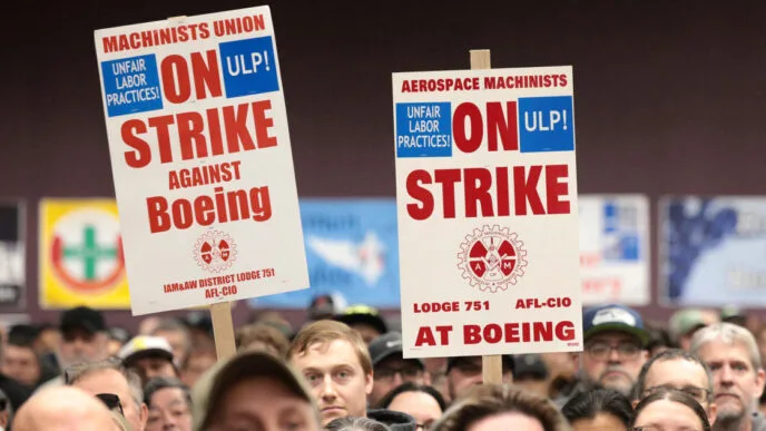 Boeing machinists reject new labor contract, extending strike