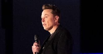 Elon Musk says all voting should be 'in person' while his super PAC promotes voting by mail