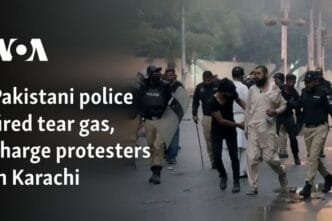 Pakistani police fired tear gas, charge protesters in Karachi