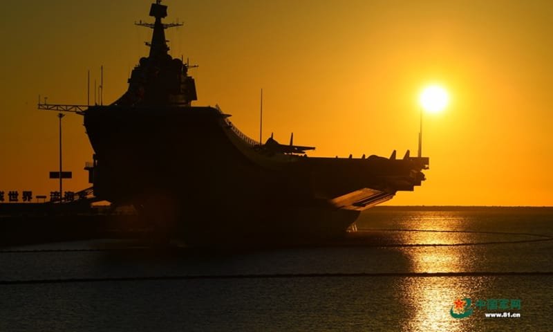 The picture shows aircraft carrier Shandong berths at a naval port in Sanya. China