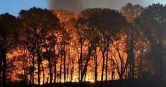 Wildfires rage across the Northeast as 27 million people remain under fire alerts