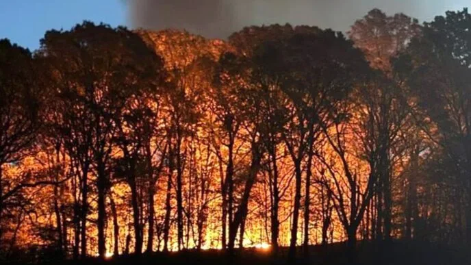 Wildfires rage across the Northeast as 27 million people remain under fire alerts