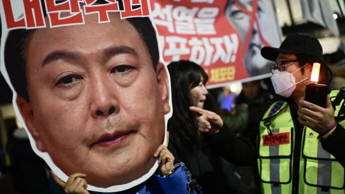 South Korea imposes travel ban on president amid martial law fallout