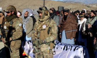 Thousands attend the funeral of a Taliban minister killed by an Islamic State suicide bomber