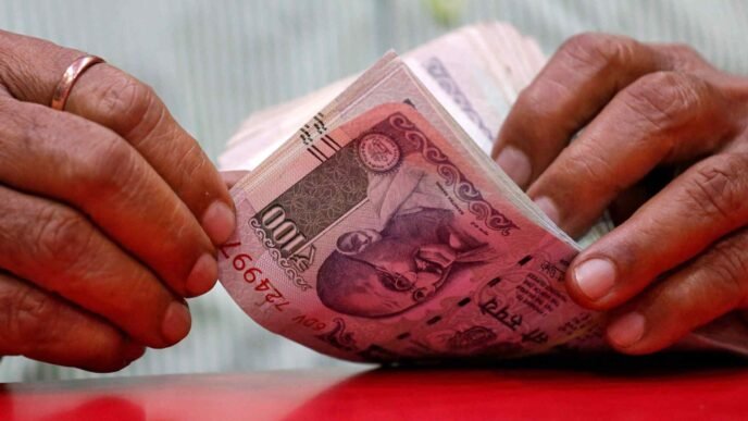 India should let the rupee slide gradually