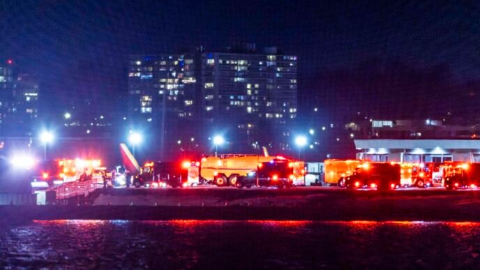 Plane crashes near Washington's Reagan Airport, grounding flights
