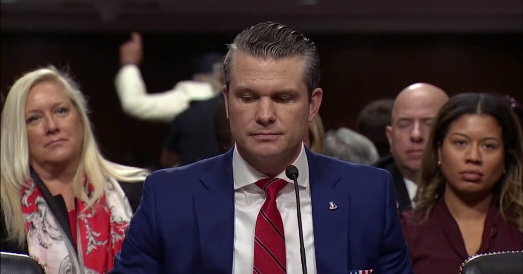 Protesters interrupt Pete Hegseth's opening statement