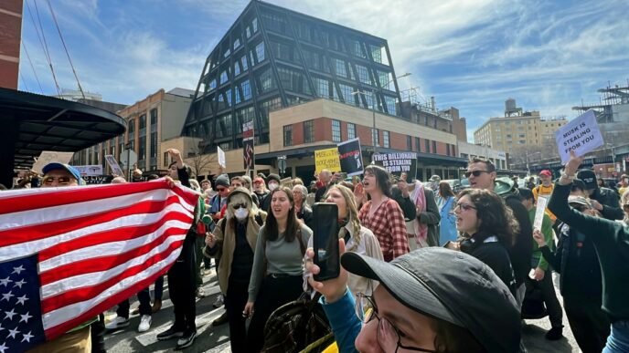 Protesters gather outside Tesla showrooms and dealerships to denounce Elon Musk and DOGE