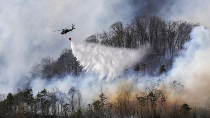 South Carolina wildfire keeps growing as firefighters protect homes
