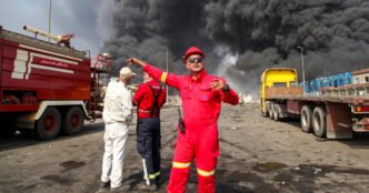 A massive explosion at an Iranian port linked to missile fuel shipment kills 14, injures more than 750