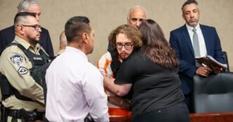 A woman hugs the man who fatally shot her brother and 22 more in a racist attack at a Texas Walmart