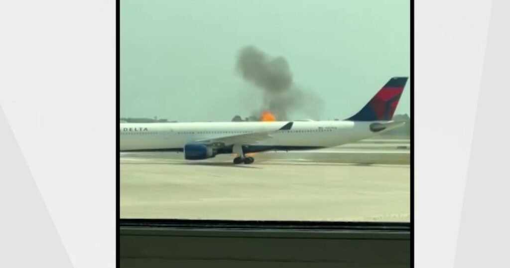 Delta plane evacuates passengers after engine catches fire