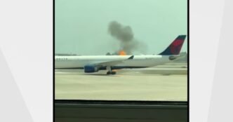 Delta plane evacuates passengers after engine catches fire