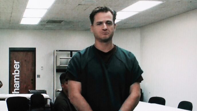 Doctor accused of trying to kill wife by bashing her with rock on Hawaii hike pleads not guilty