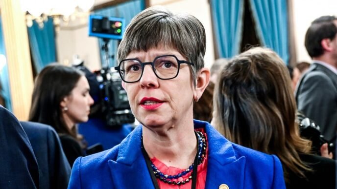 Michigan lawmaker penalized after covering Republican colleague's car in plastic wrap