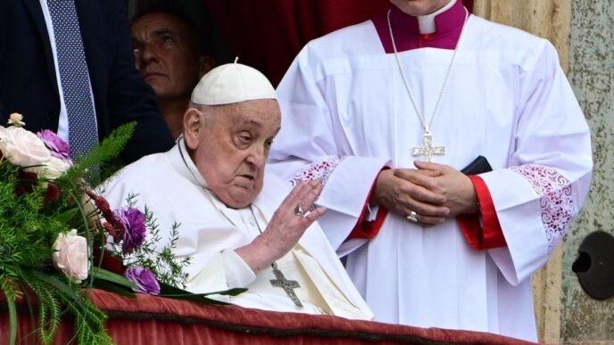 Pope Francis skips Easter mass, but greets worshippers from St. Peter's Basilica