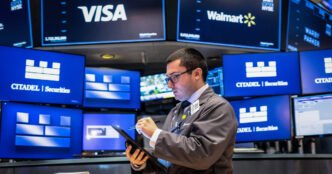 S&P 500 closes higher to start new quarter as traders await Trump's tariff rollout