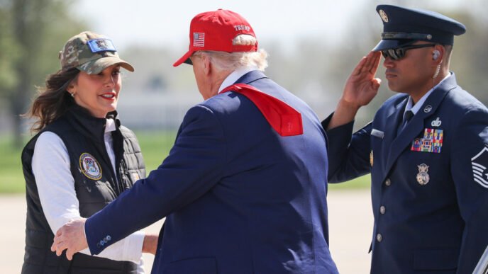 Trump praises Gov. Gretchen Whitmer while at Michigan air base