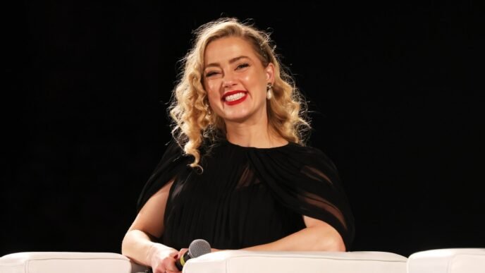 Amber Heard shares she has welcomed twins in surprise Mother’s Day announcement
