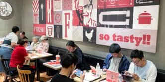 China consumer belt-tightening constrains KFC operator, Starbucks