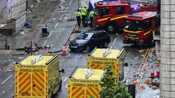 Driver detained after car drives into crowd at Liverpool parade