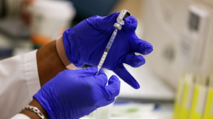 Fall Covid vaccine rollout for healthy kids, adults likely delayed by new FDA trial rule