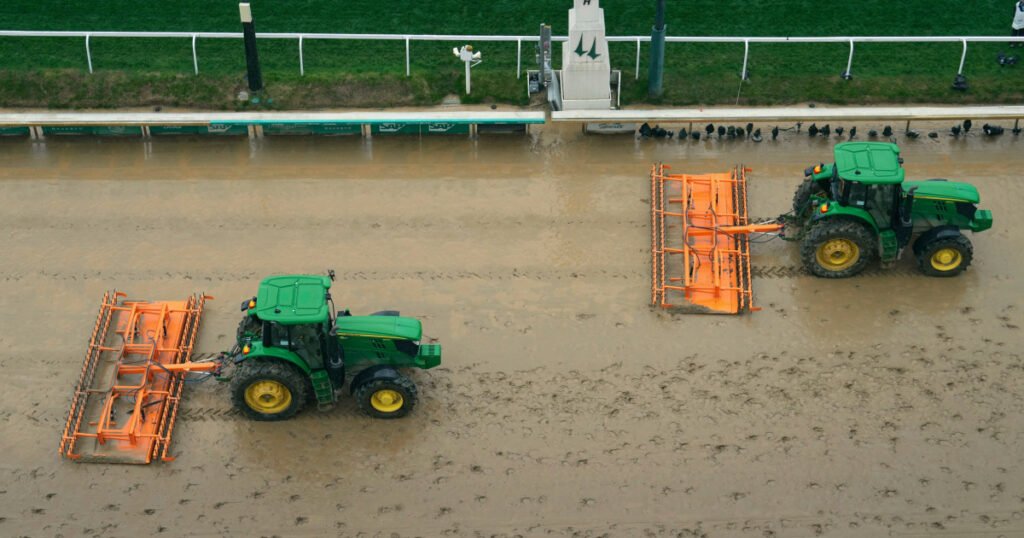 Fans (and horses) aren't letting wet conditions stop their fun