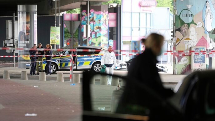 German police search for a man who attacked and injured at least 5 people outside a bar