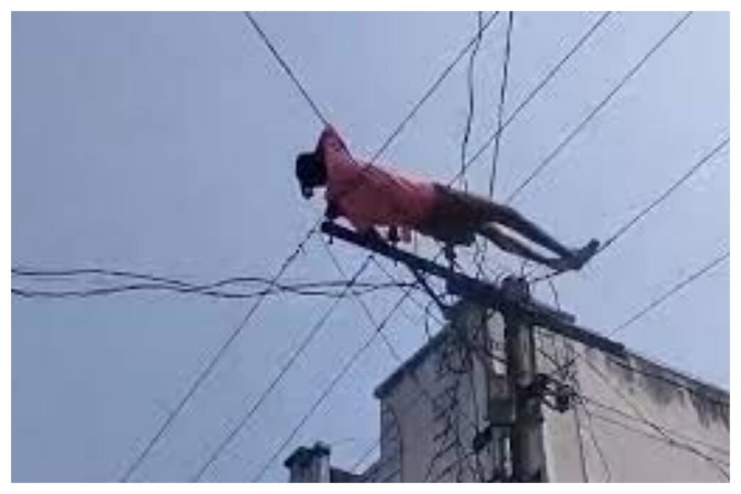 Mentally challenged youth climbs electric pole, rescued