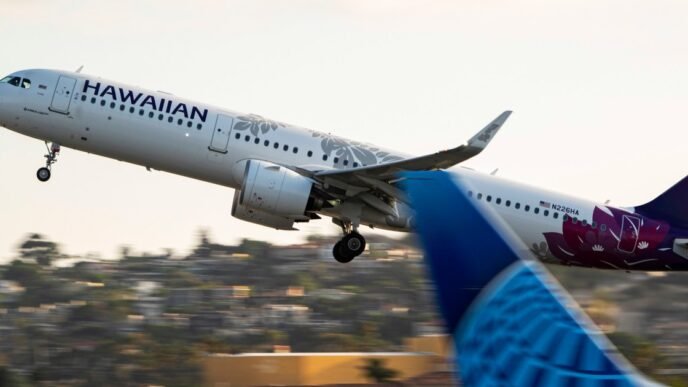 Navy technician charged with making a false bomb threat on a Hawaiian Airlines flight