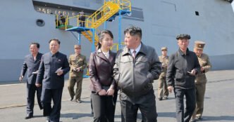 New North Korean warship is damaged at launch ceremony as leader Kim looks on