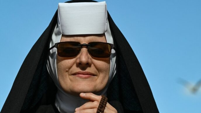 Nuns gather outside papal conclave at Sistine Chapel in Vatican City