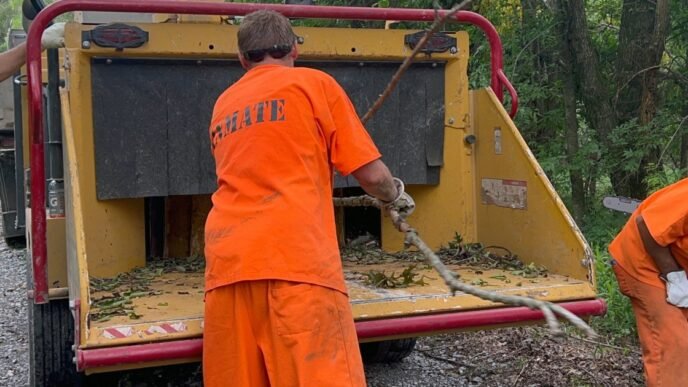 Oklahoma inmates clear debris to free family trapped for more than a week