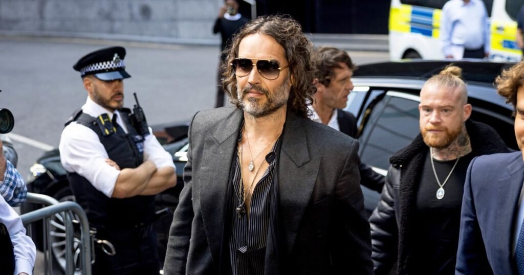 Russell Brand arrives at London court to face rape and sexual assault charges