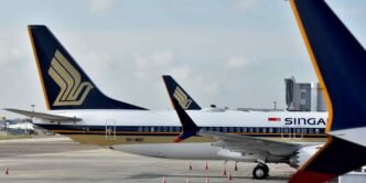 Singapore Airlines warns of trade headwinds despite record annual profit