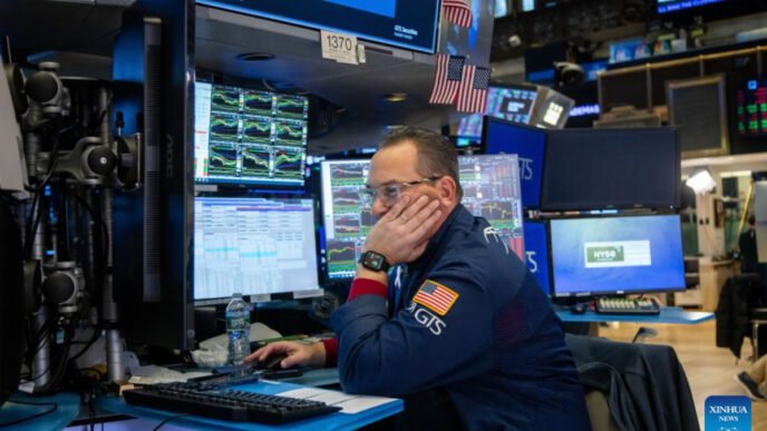 A trader works on the floor of the New York Stock Exchange in New York, the United States, on Feb. 3, 2025. U.S. stocks ended lower on Monday, as investors reacted to the Donald Trump administration