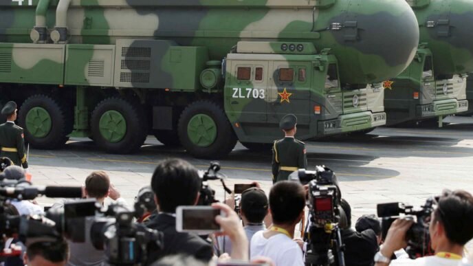 China adds 100 nuclear warheads in past year, report shows