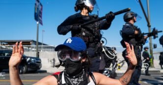 Crowds protesting immigration raids ordered to leave downtown