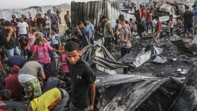 Dozens of aid seekers among 82 Palestinians killed in Israeli attacks on Gaza