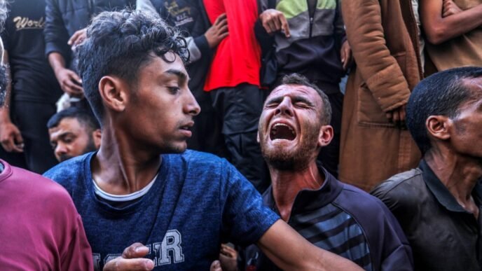 Israeli forces kill dozens of Palestinians seeking aid in Gaza, health officials say