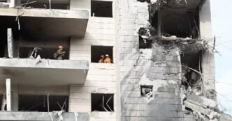 Israeli residents react to Iranian missile strike