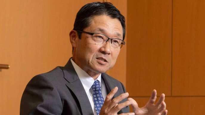 Japan's financial watchdog commissioner to step down