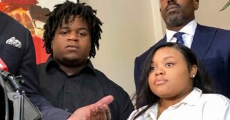 Attorney Roderick Edmond, left, speaks alongside Treveon Isaiah Taylor, Sr., center, Jessica Ross and attorney Cory Lynch, in Atlanta on Aug. 9, 2023.