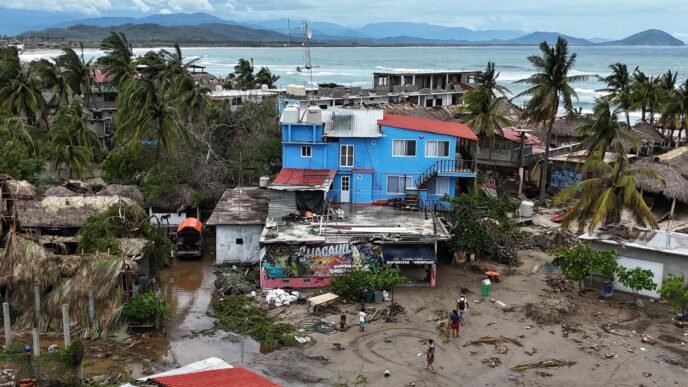 Mexico assesses damage from Hurricane Erick as rising rivers leave at least 1 dead