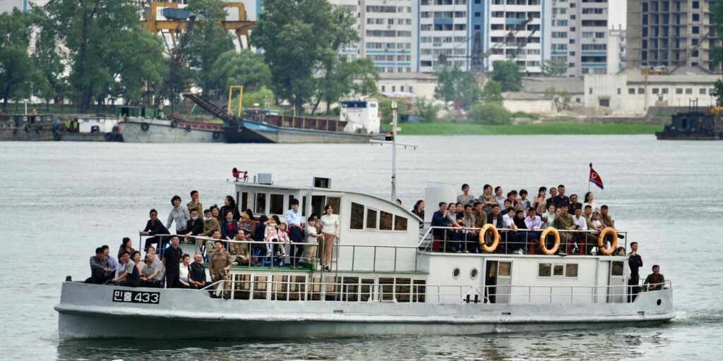 North Korean tourists take in glimpses of Chinese prosperity