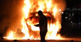 Rioters attack police and torch houses for a second night in Northern Ireland