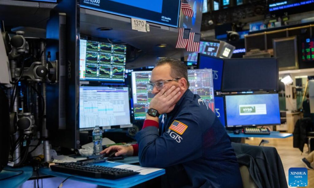 A trader works on the floor of the New York Stock Exchange in New York, the United States, on Feb. 3, 2025. U.S. stocks ended lower on Monday, as investors reacted to the Donald Trump administration