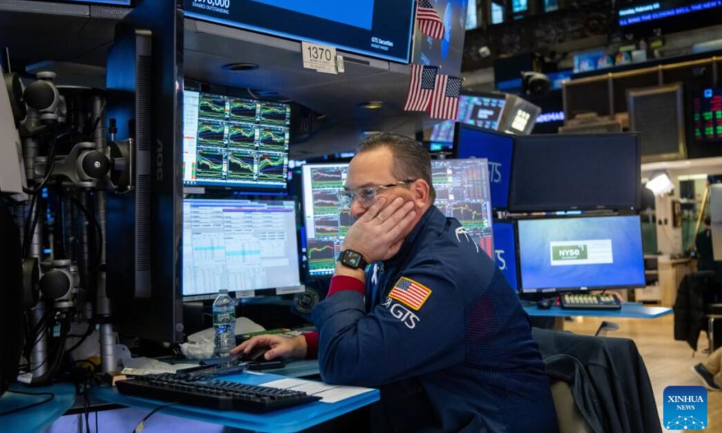 A trader works on the floor of the New York Stock Exchange in New York, the United States, on Feb. 3, 2025. U.S. stocks ended lower on Monday, as investors reacted to the Donald Trump administration