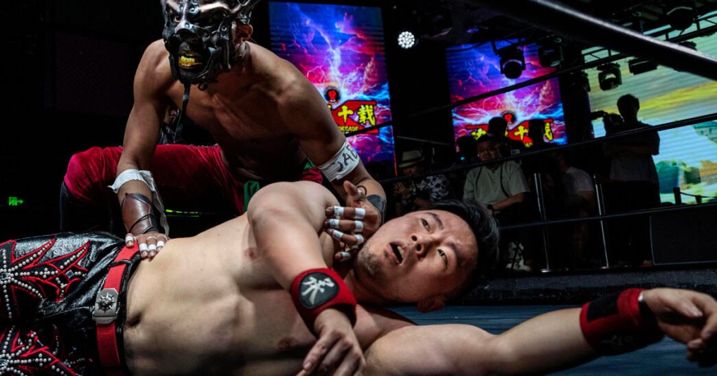 With kung fu kicks and dragon masks, pro wrestlers find new fans at fight night in China